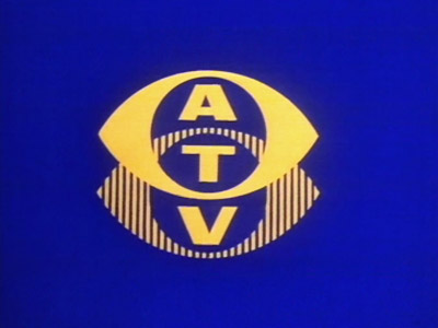 Yellow-on-blue, double-eye ATV symbol (20K)