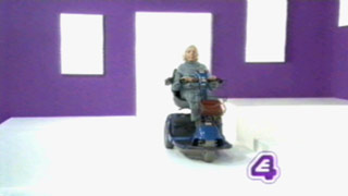 E4 ident with a woman riding a mobility scooter (10K)