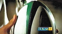 ITV1 Rugby World Cup 2003 ident - close-up of hands holding a rugby ball (8K)