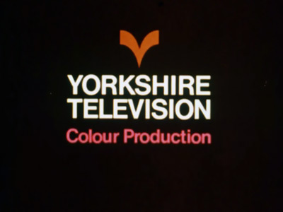 Yorkshire Television in white capitals, with its orange chevron symbol above, all on a black background (20K)