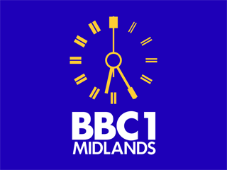 Yellow clock with white BBC 1 MIDLANDS lettering underneath