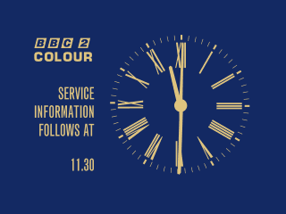 BBC 2 COLOUR Service Information clock with Roman numerals on the dial - yellow on a blue background