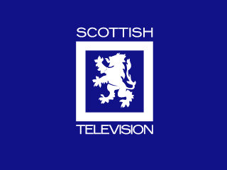 Scottish Television colour ident - a rampant white lion enclosed by a thick rectangular border on a blue background