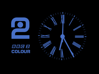 BBC 2 COLOUR clock with roman numerals on the dial