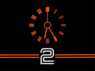 Orange BBC 2 network clock from 1979 with twin-stripe design